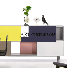 Marbrasse mantel accent vase blends modern style with natural greenery.
