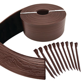 Master Mark Terrace Board Edging defines garden beds with a textured border.