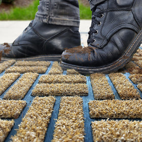 MATALL low-profile half-inch mat fits under doors without sticking.