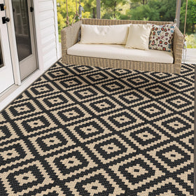 Mattitude waterproof outdoor rug 5x8 foldable for easy transport and quick setup.