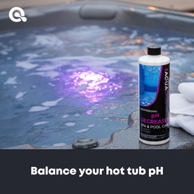 AquaDoc spa pH decreaser 2pack bottle close-up shows easy-to-pour liquid for calm spa water