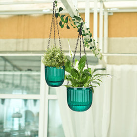 Maxcheck indoor and outdoor-ready planters shown in a living space