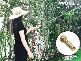 MAXFLO 2-pack nozzle in action for watering, cleaning, and patio maintenance