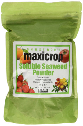 Maxicrop Pure Seaweed Extract bottle showing soluble powder for plant growth support.