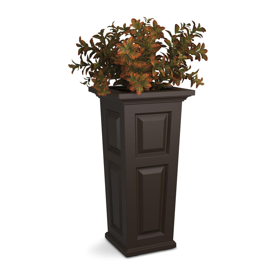 Mayne Nantucket planter with paneled design enhances outdoor elegance and curb appeal.