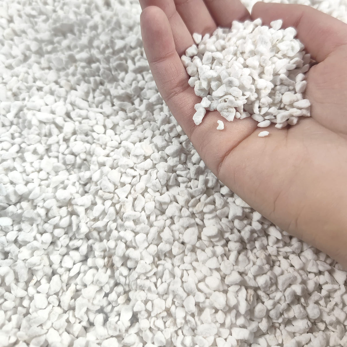 MDPQT 20 Qt perlite bag on a workbench, premium horticultural grade for gardening.