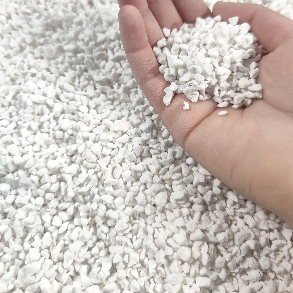 MDPQT 20 Qt perlite bag on a workbench, premium horticultural grade for gardening.