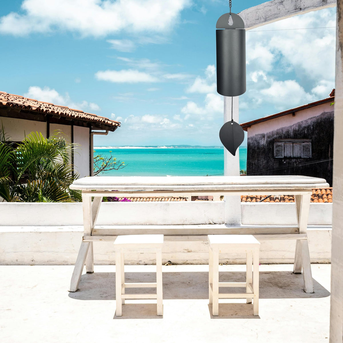 MEDOO Serenity Bell outdoor view shows black finish blending with garden spaces.