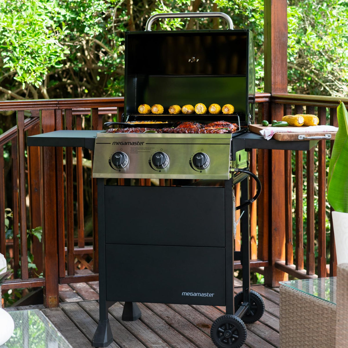 Megamaster foldable side tables and warming rack simplify prep and serving on the patio.