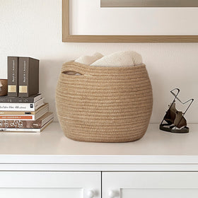 MEGASKET toy-bin basket in living room for organized play area.