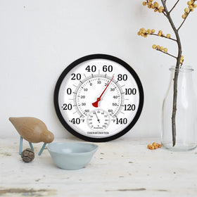 MEINV black outdoor thermometer complements modern exteriors while tracking temperature and humidity.