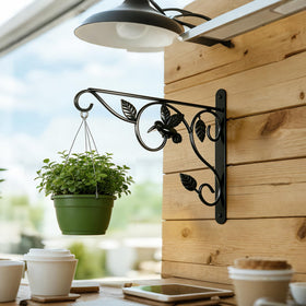 Mekpiwu black bracket enhancing outdoor decor with sturdy mounting.