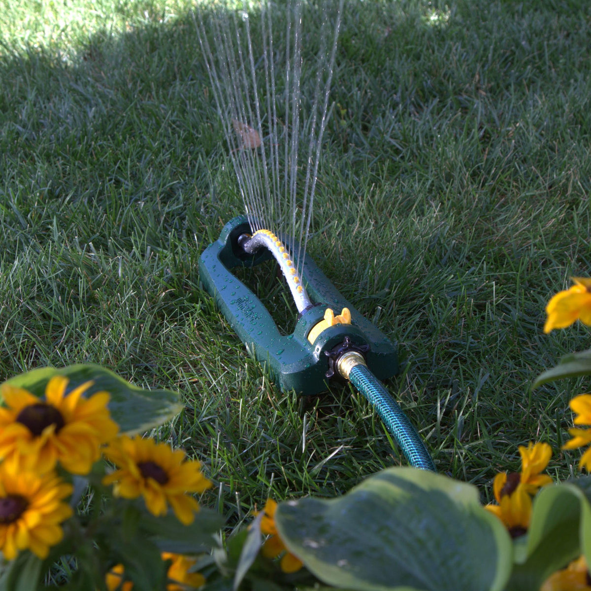 Overspray adjustment tabs helping limit waste near driveways