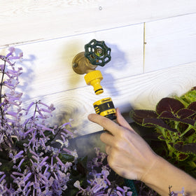 Melnor QuickConnect tool adapter attached to a wand for wide area coverage