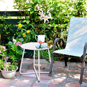 Meluvici compact table fits beside chairs for snacks and small spaces.