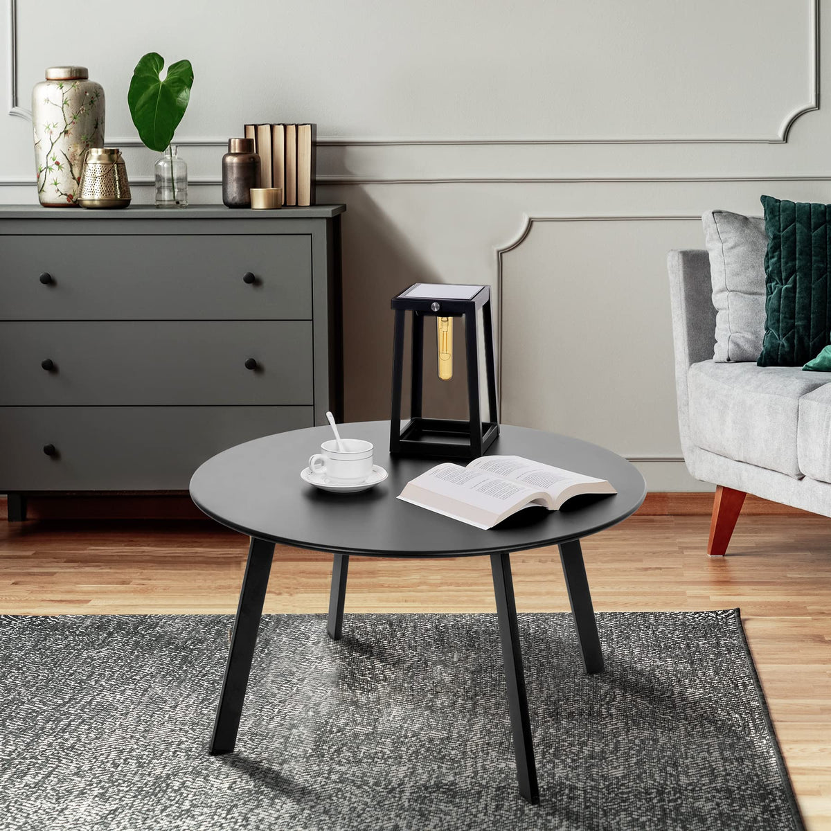 Meluvici outdoor side table with U-shaped legs in black provides stable support