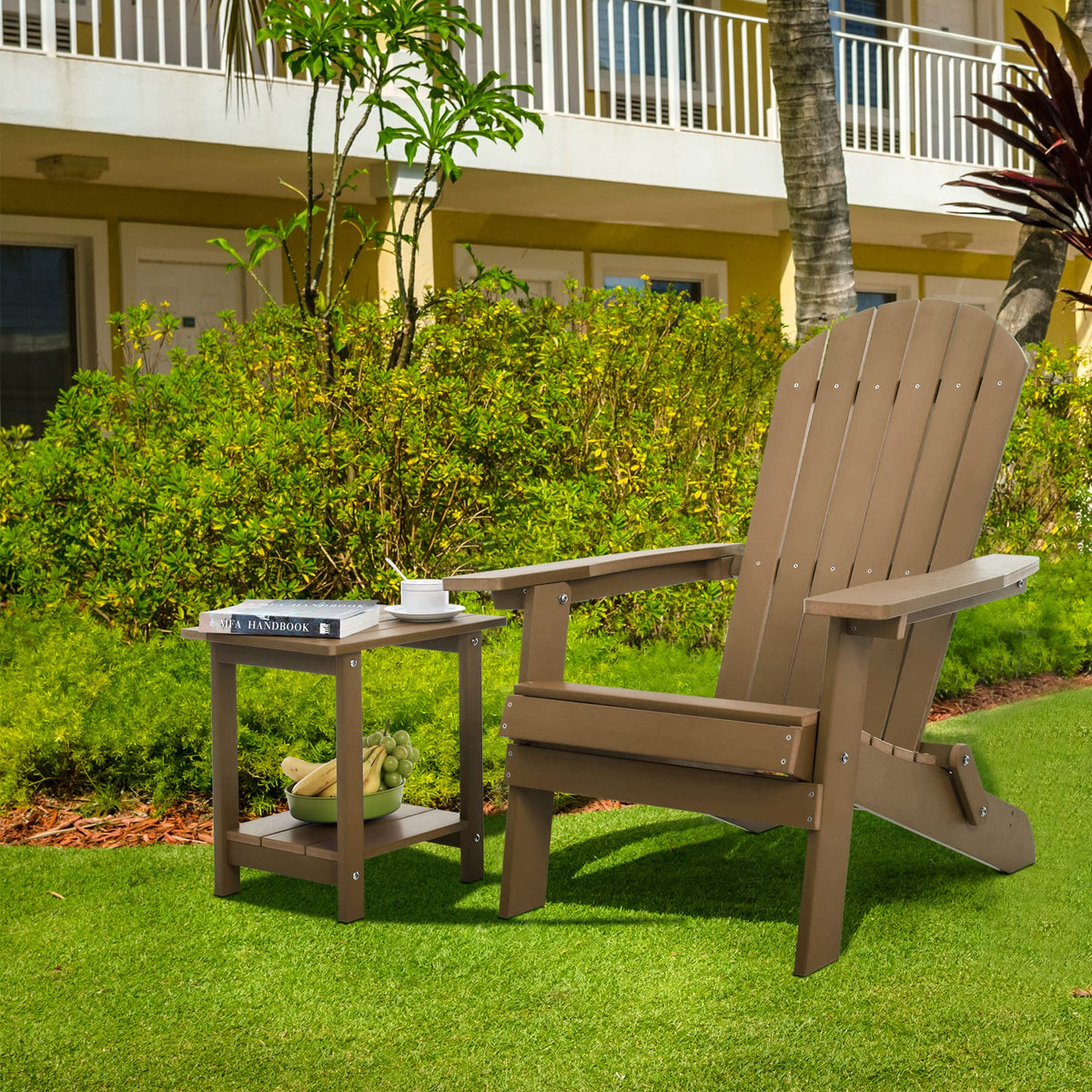 Meluvici table beside Adirondack chair enhances outdoor lounging moments.