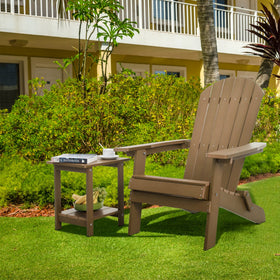 Meluvici table beside Adirondack chair enhances outdoor lounging moments.