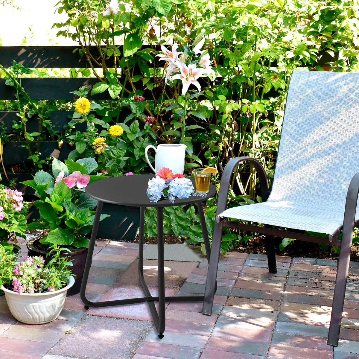 Meluvici Patio small side table on balcony, rust-resistant finish for long outdoor life.
