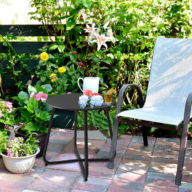 Meluvici Patio small side table on balcony, rust-resistant finish for long outdoor life.