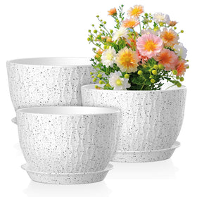 Meowell 12-inch ripple pot with drainage holes for indoor plants.