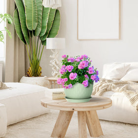 Meowell ripple pot saucers in green protect surfaces from spills