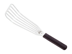 Mercer Culinary Hell's Handle stainless blade in action on grill.