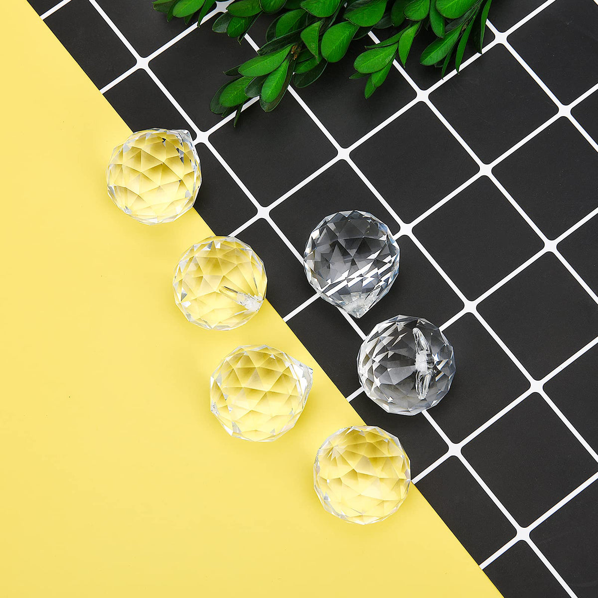 MerryNine hanging crystal prisms used as Feng Shui accent for calm energy