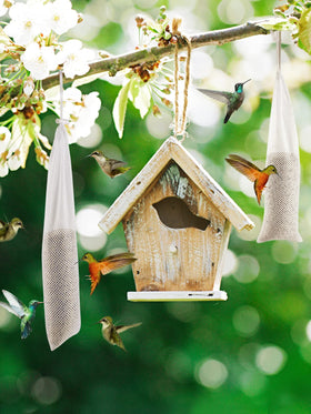 MEWTOGO thistle seed sacks ready for durable, reusable bird feeding in the yard.