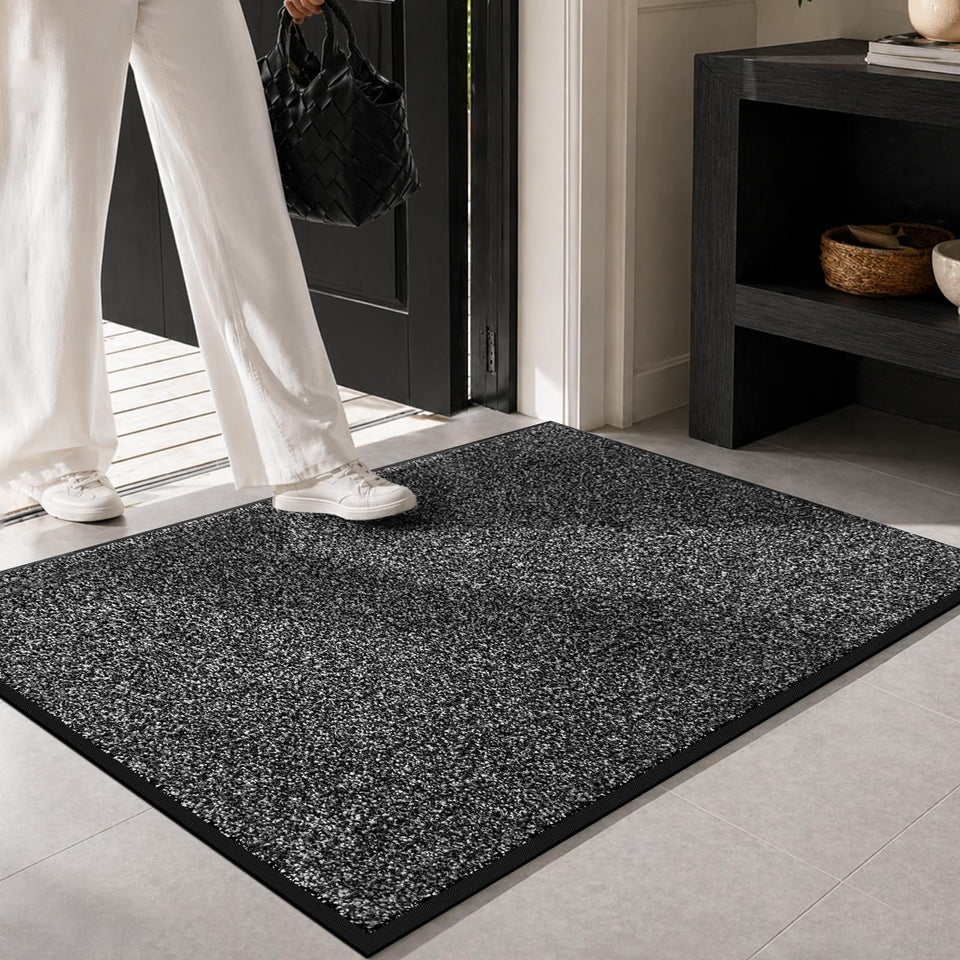 Mibao dirt-trapper front door mat in grey catching dirt at the doorway