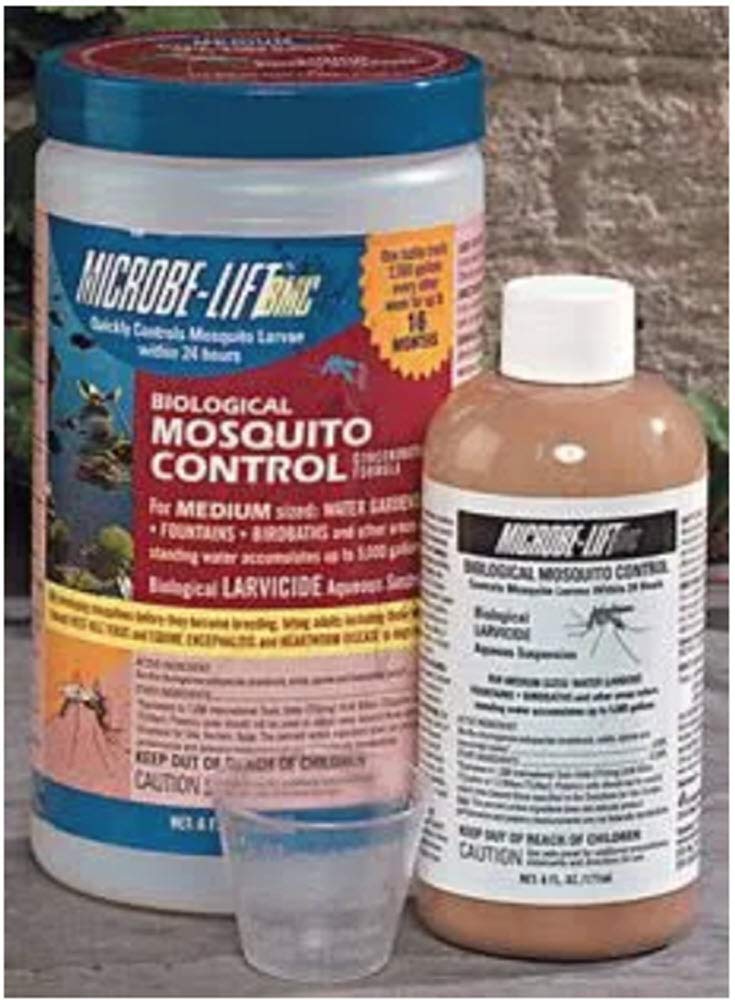 Microbe-Lift BMC liquid treatment disperses through water in a decorative pond