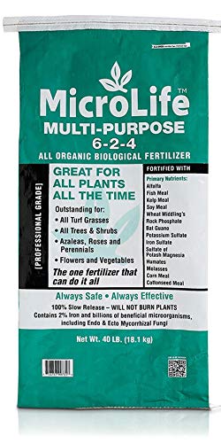 Microlife SJES granular fertilizer pouring to boost soil health.