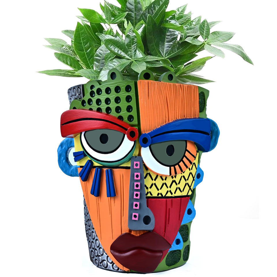 Midogaigai abstract face pot with drainage holes for healthy plants.