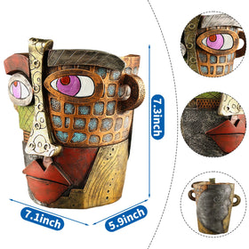 Midogaigai hand-painted face planter adds unique character to homes or offices.
