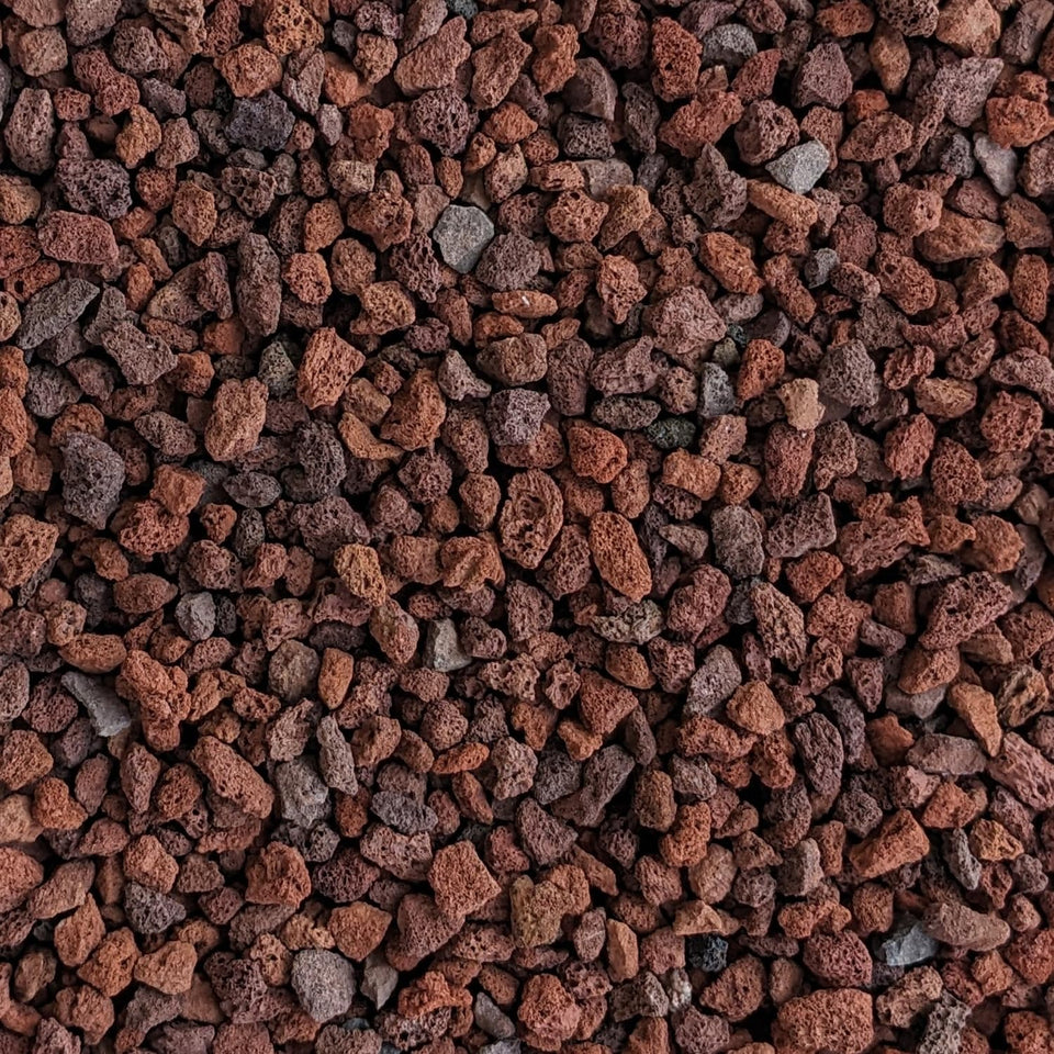 Midwest Hearth Red Lava Rocks 1/4-inch close-up for improved drainage in planters.