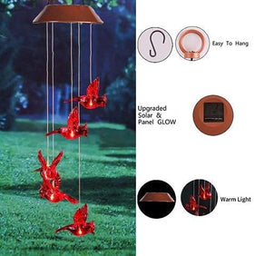 Milcraft cardinal wind chime on porch providing evening ambient light