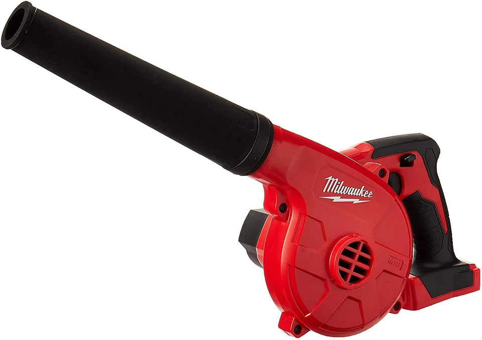 Milwaukee 0884-20 M18 compact yard leaf blower in action for tight spaces.