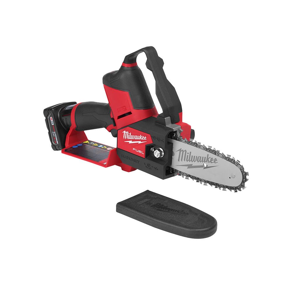 Milwaukee M12 Fuel Hatchet in action pruning a small limb