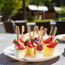 Minisland canapes and appetizers setup using bamboo skewers.