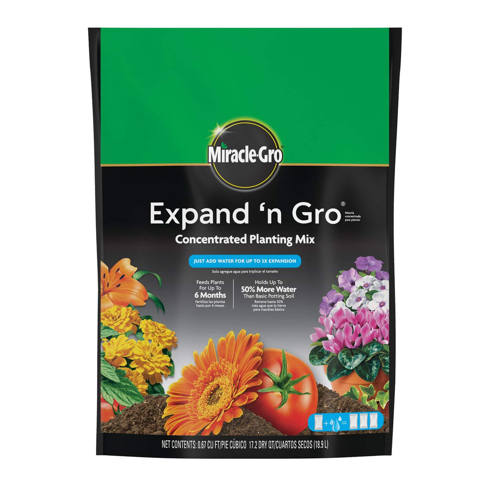 Miracle-Gro Expand 'n Gro bag expanding with water for richer planting mix.