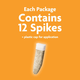 Miracle-Gro Fruit & Citrus spikes in soil around dripline delivering root nutrients.