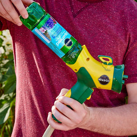 Miracle-Gro LiquaFeed connected to hose during watering creates a seamless feeding routine.
