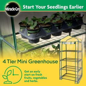 Miracle-Gro mini greenhouse side view highlights sturdy steel frame for outdoor use.