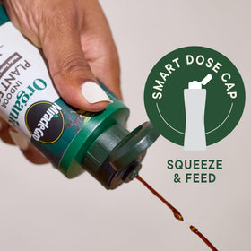Miracle-Gro Organic Indoor Plant Food cap close-up showing smart-dose cap