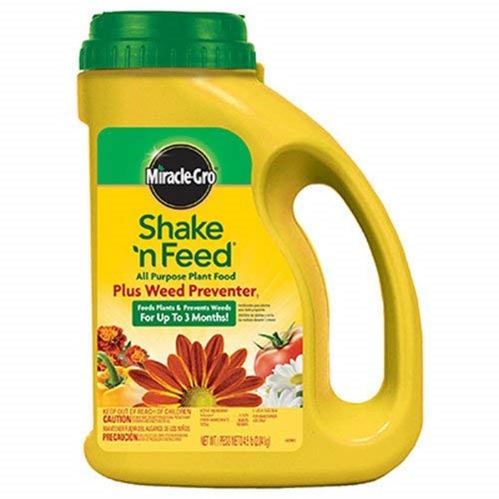 Miracle-Gro Shake 'N Feed weed preventer bag ready to feed garden plants.