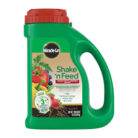 Miracle-Gro Shake 'N Feed bottle with calcium-rich formula for stronger plant cells.