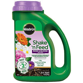 Miracle-Gro Shake 'n Feed Rose & Bloom plant food bag ready for simple application