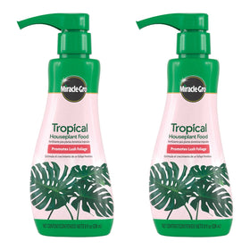 Miracle-Gro Tropical Houseplant Food bottle pour showing easy dosing for lush foliage
