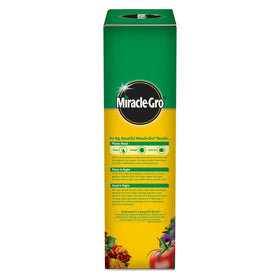 Outdoor garden plants being fed with Miracle-Gro to encourage healthy growth.