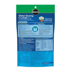Miracle-Gro Water Storing Crystals in outdoor beds buffering moisture during drought.